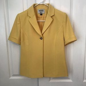 Kasper Women’s Short Sleeve Suit Jacket in the color Gold. Size: 6